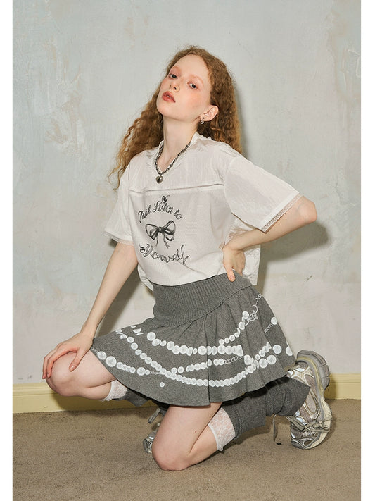 تنورة محبوكة بطبعة اللؤلؤ