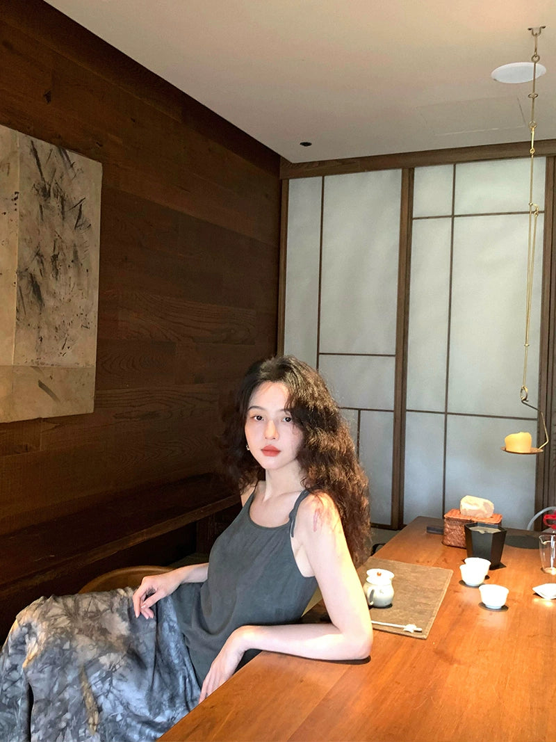 Camisola con dobladillo irregular y cordones