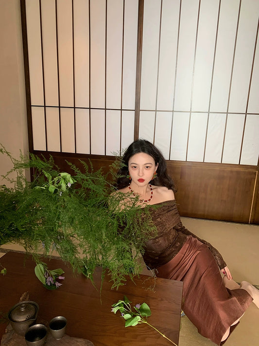 Top de manga larga de malla rosa con un solo hombro