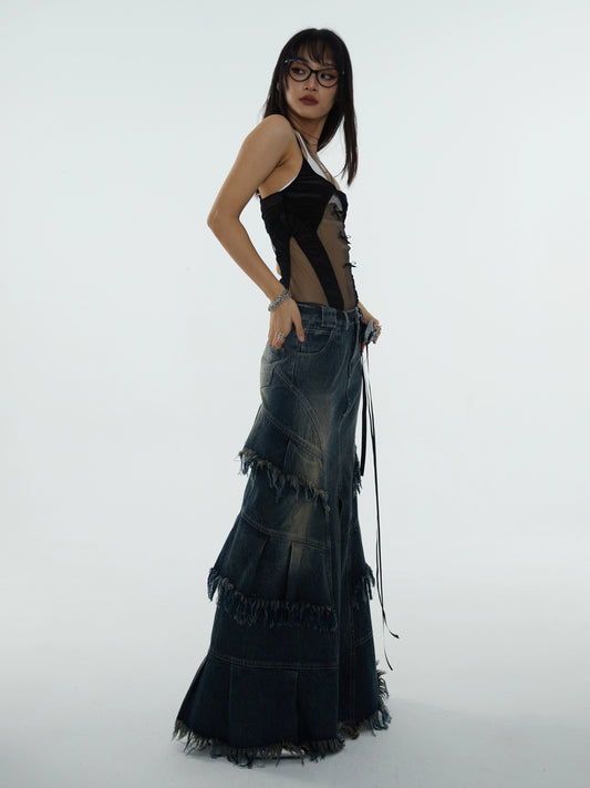 Jupe très longue en jean effet vieilli en forme de A