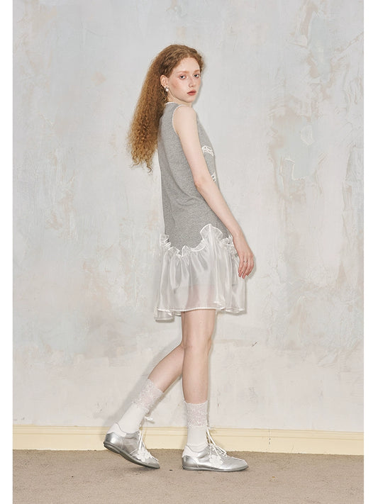 فستان بدون أكمام مطرز بفيونكة مجوفة