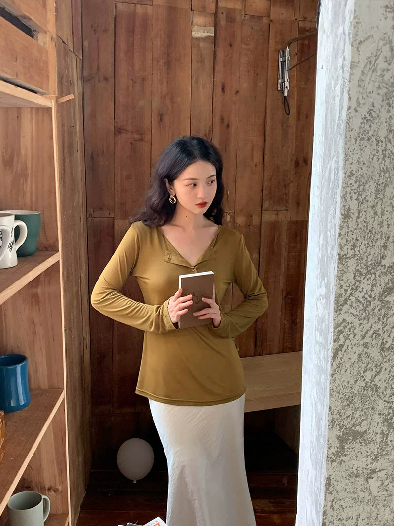 Top drapeado retro con cuello en V