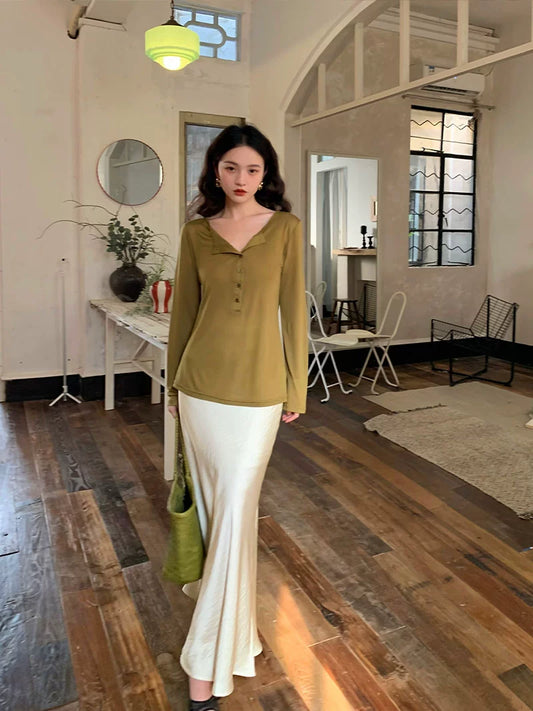 Top drapeado retro con cuello en V