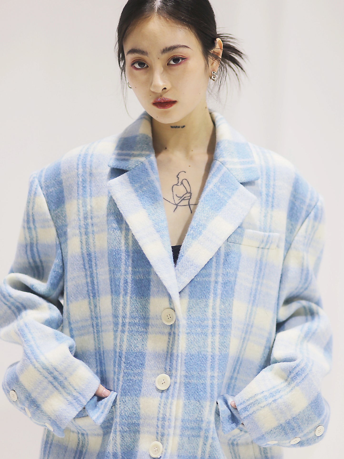 سترة صوفية منقوشة من الصوف باللون الأزرق السماوي