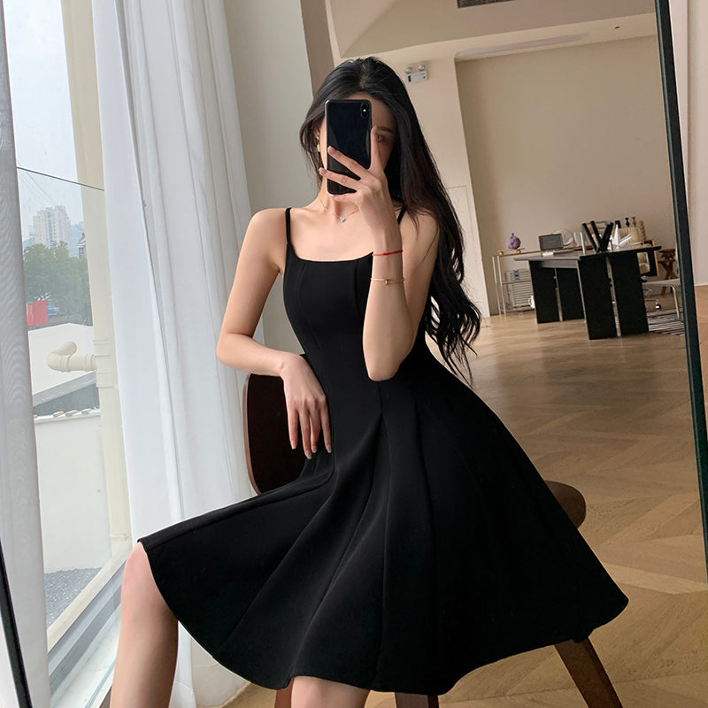 STYLISH AND SLEEK: Slim Black Strap Dress for A CHIC SUMMER LOOK Serendute STYLISH AND SLEEK: Slim Black Strap Dress for A CHIC SUMMER LOOK Serendute
