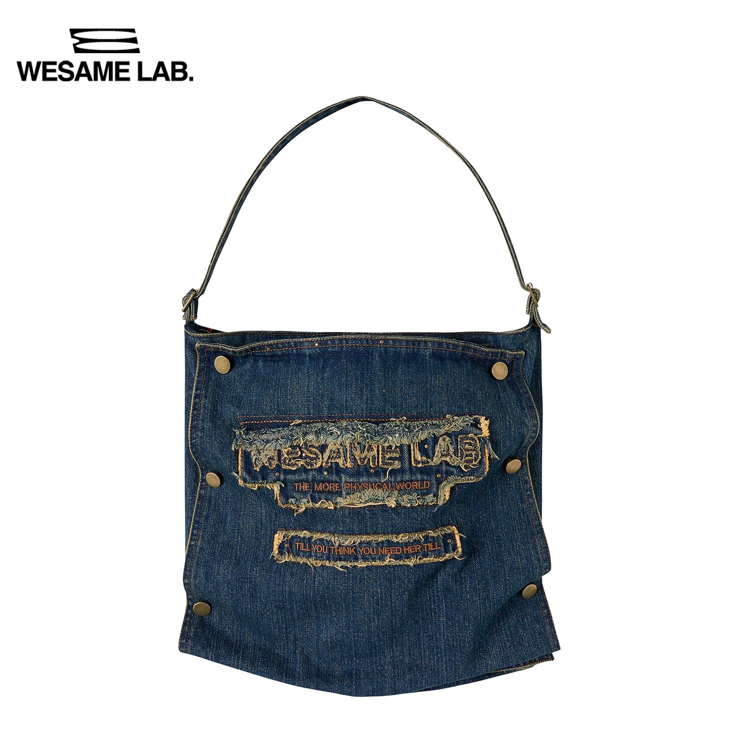 Una borsa di denim retrò un chiodo calda con spalla