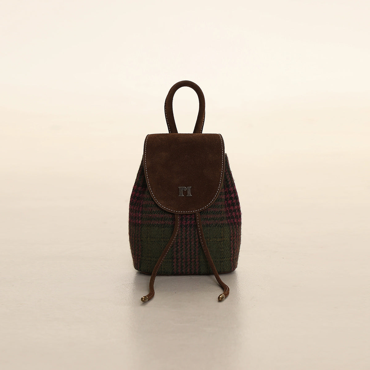 Zaino in pelle scamosciata con griglia rosa verde