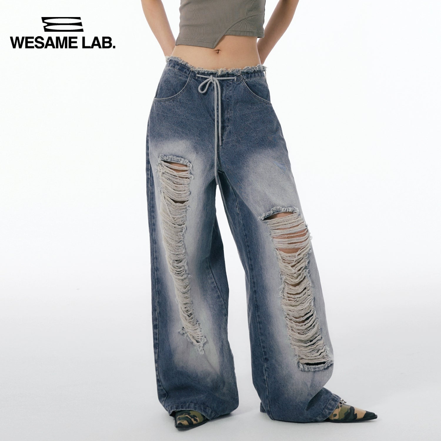 Jeans American street con lavado de agujeros Pantalón casual con