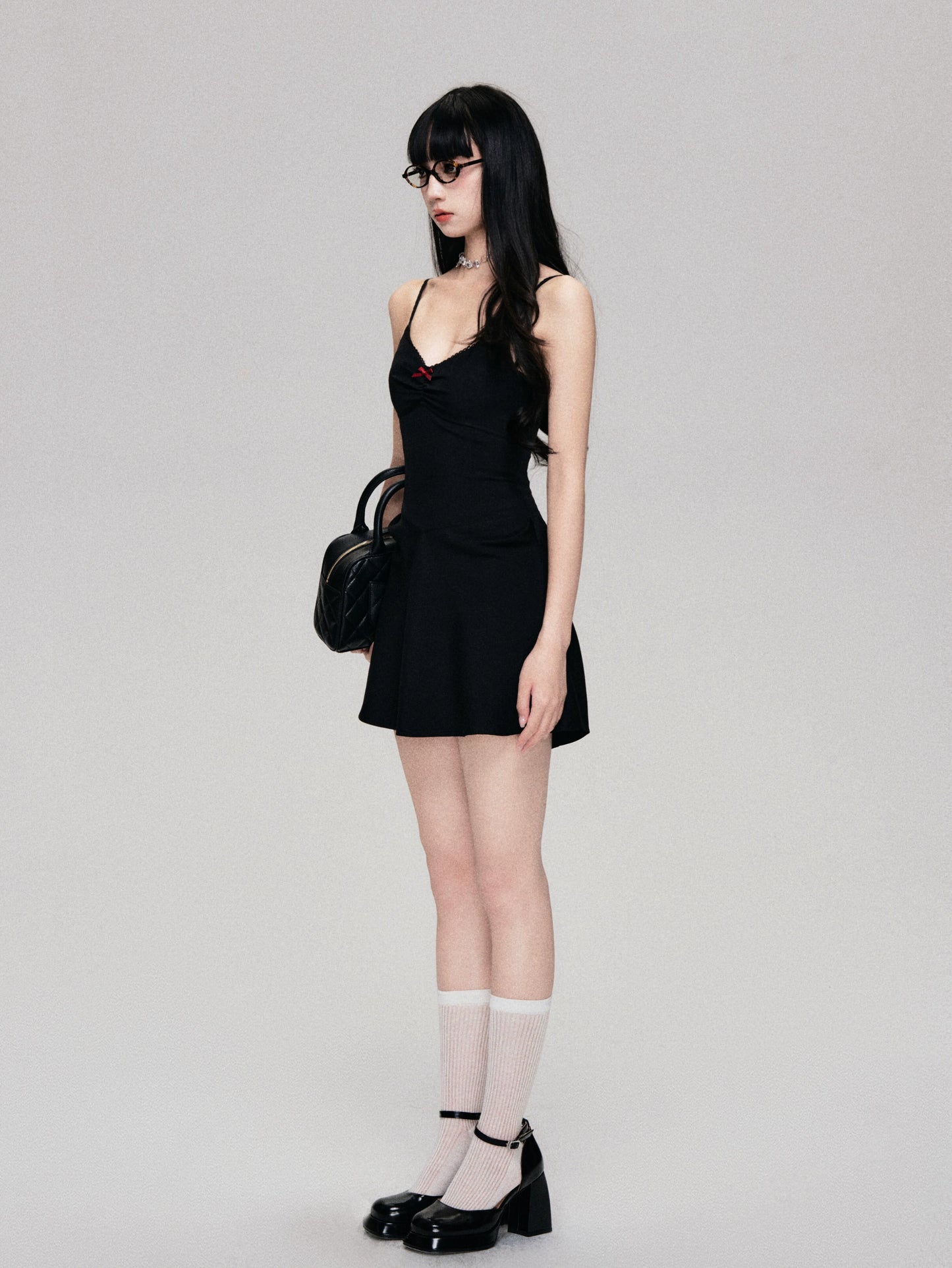 Vertical Waist Black Slip Dress for a Sexy Resort Look