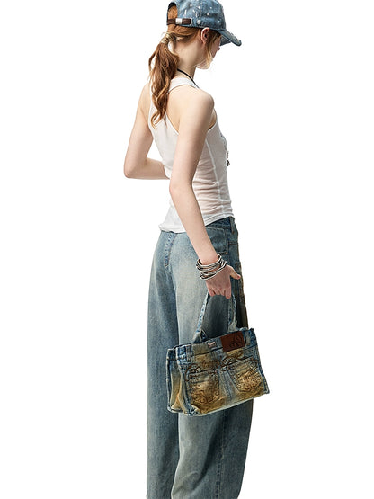 Clay-Dyed Blue Distressed Embroidered Jeans – Deconstructed Low-Rise Fit