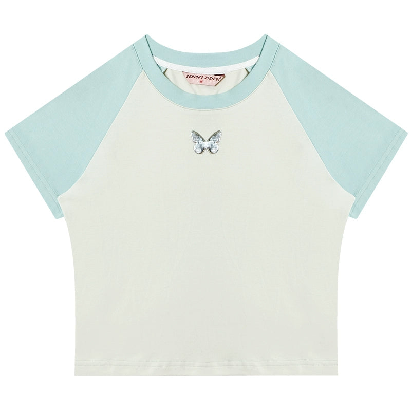 T-shirt con maniche raglan con cuciture a contrasto |. Manica corta con farfalla in metallo per l'estate