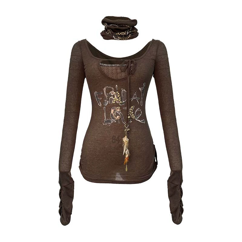 Top in maglia elastica con stampa rivetti