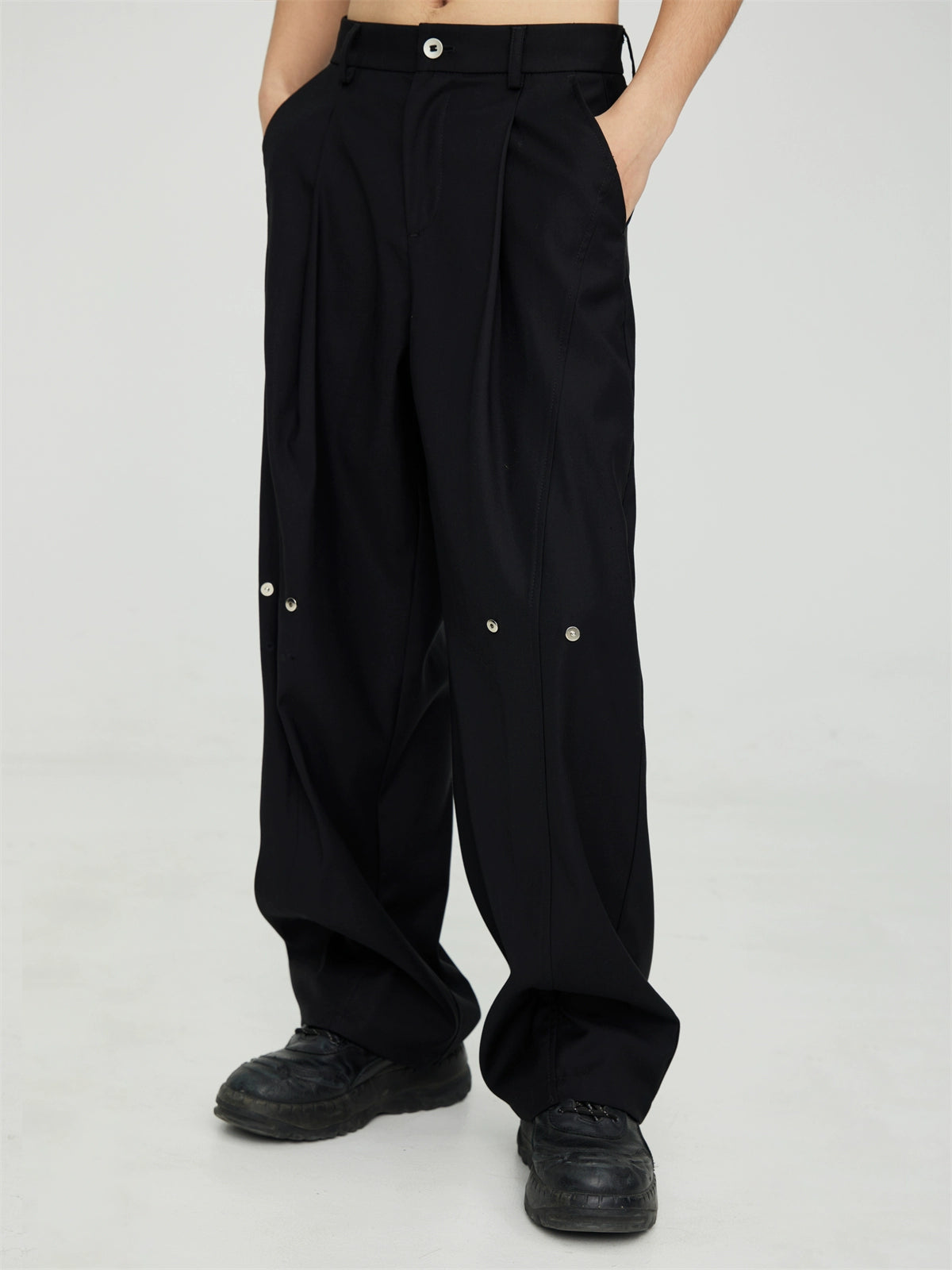 Yamamoto yoji - pantalon de drapé de jambe à l'échelle