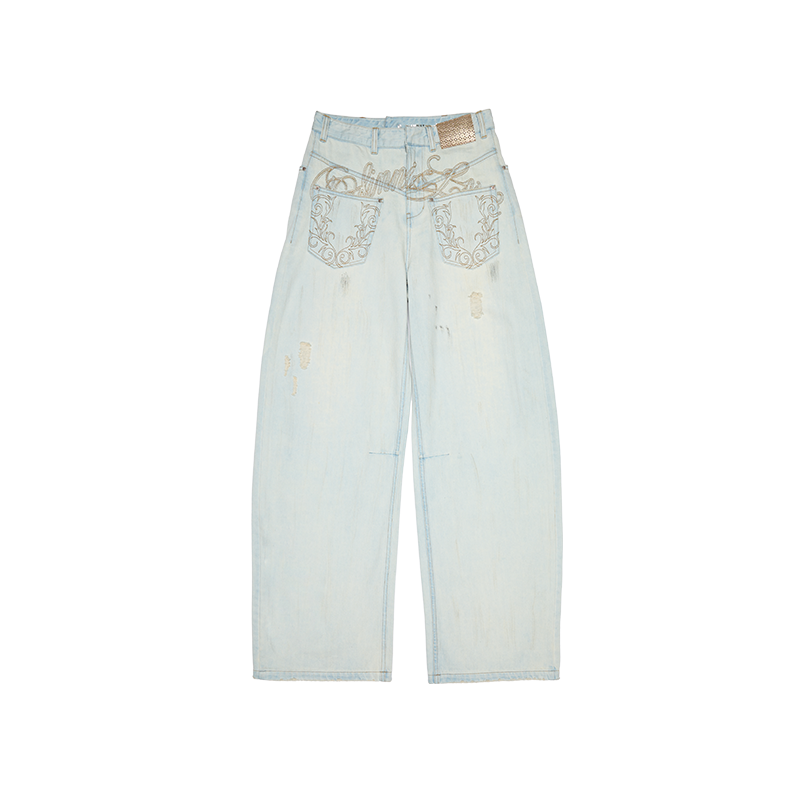 Distressed Mud-Dyed Low-Rise Scimitar Jeans – Wide-Leg Banana Pants