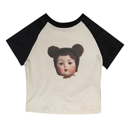 T-shirt rattoppata da orso