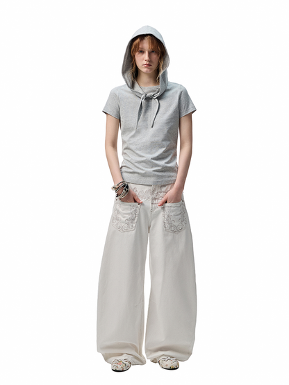 Distressed Mud-Dyed Low-Rise Scimitar Jeans – Wide-Leg Banana Pants