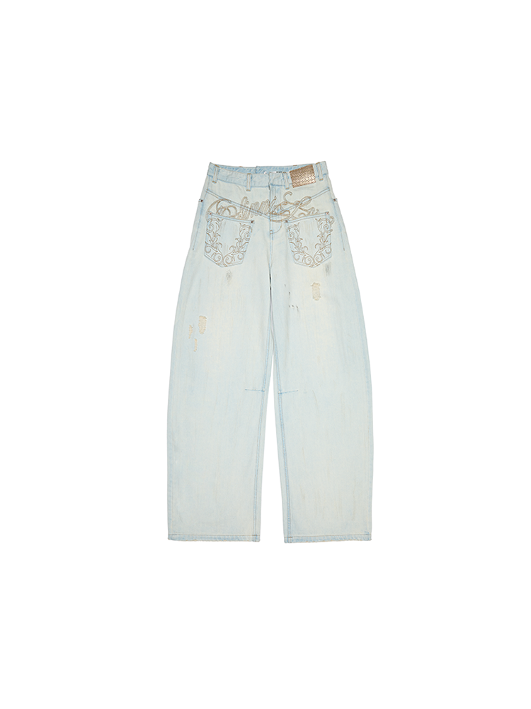 Distressed Mud-Dyed Low-Rise Scimitar Jeans – Wide-Leg Banana Pants