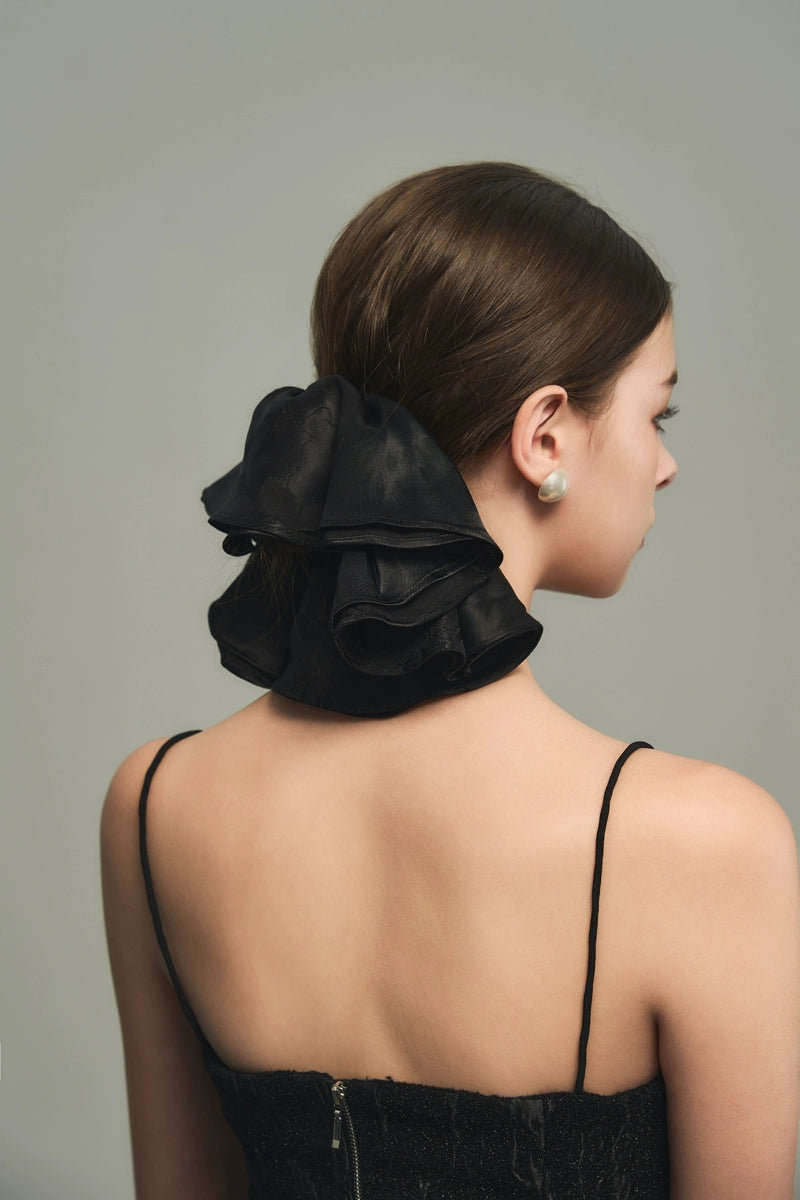 Elegante bucle de cabello de hadas