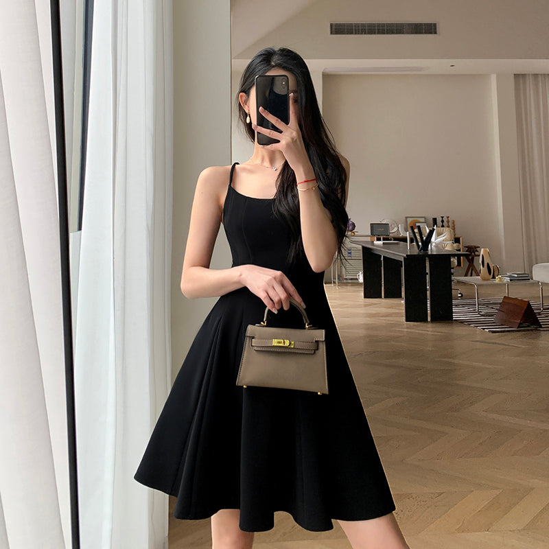 STYLISH AND SLEEK: Slim Black Strap Dress for A CHIC SUMMER LOOK Serendute STYLISH AND SLEEK: Slim Black Strap Dress for A CHIC SUMMER LOOK Serendute
