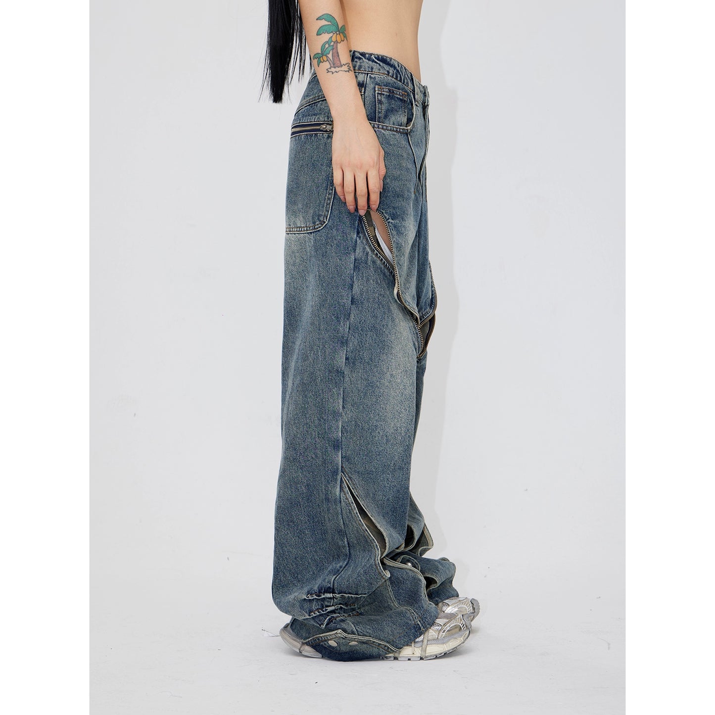 Deconstructs Hollow Out Camuflage Patchwork Jeans con diseño de nicho en angustia retro, pantalones de piernas anchas sueltas