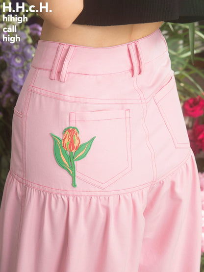 Rose rouge: pantalon à jambes larges plissées contrastées